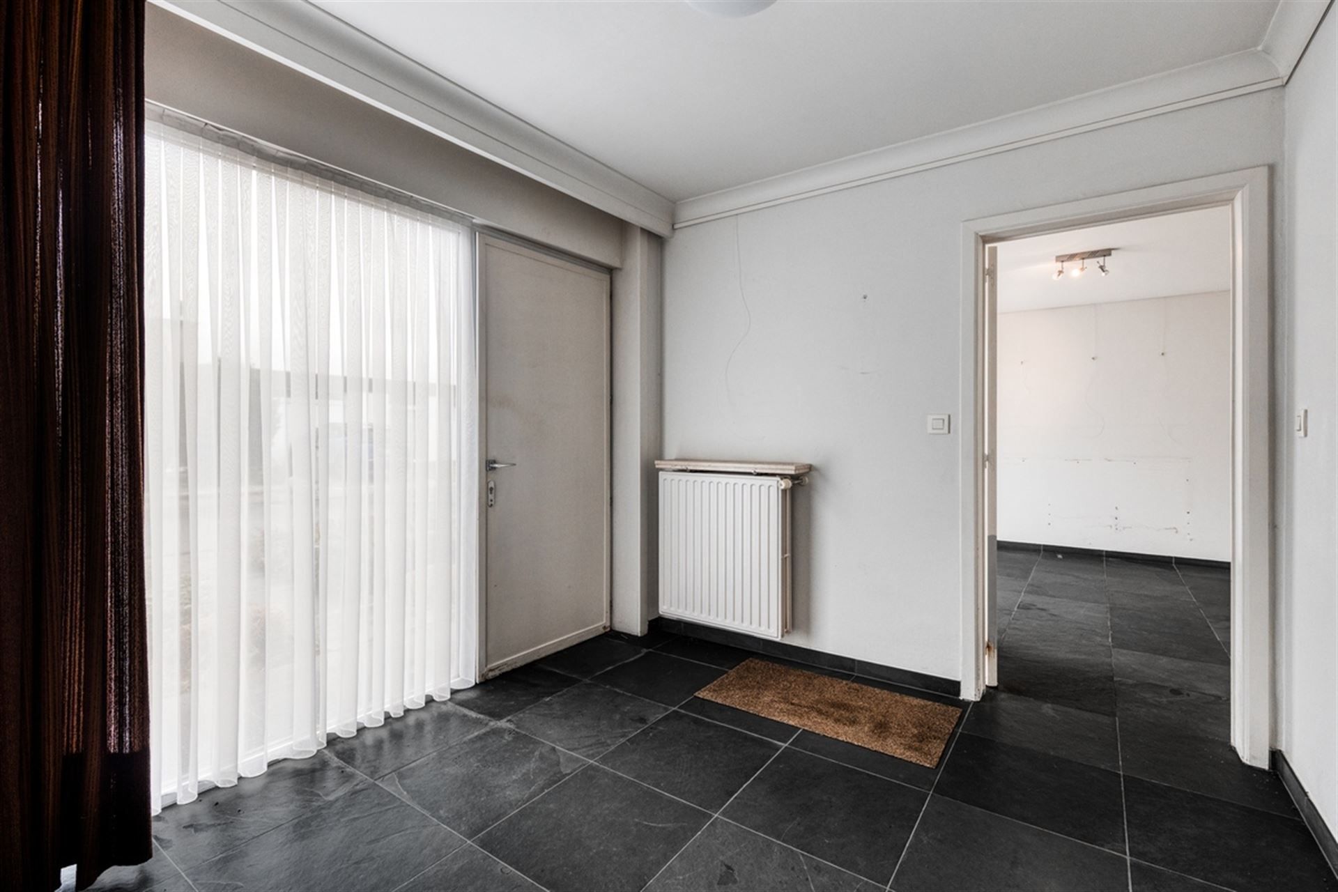 Moderne, zéér praktische woning met leuke tuin! 3 Slpks. foto 3