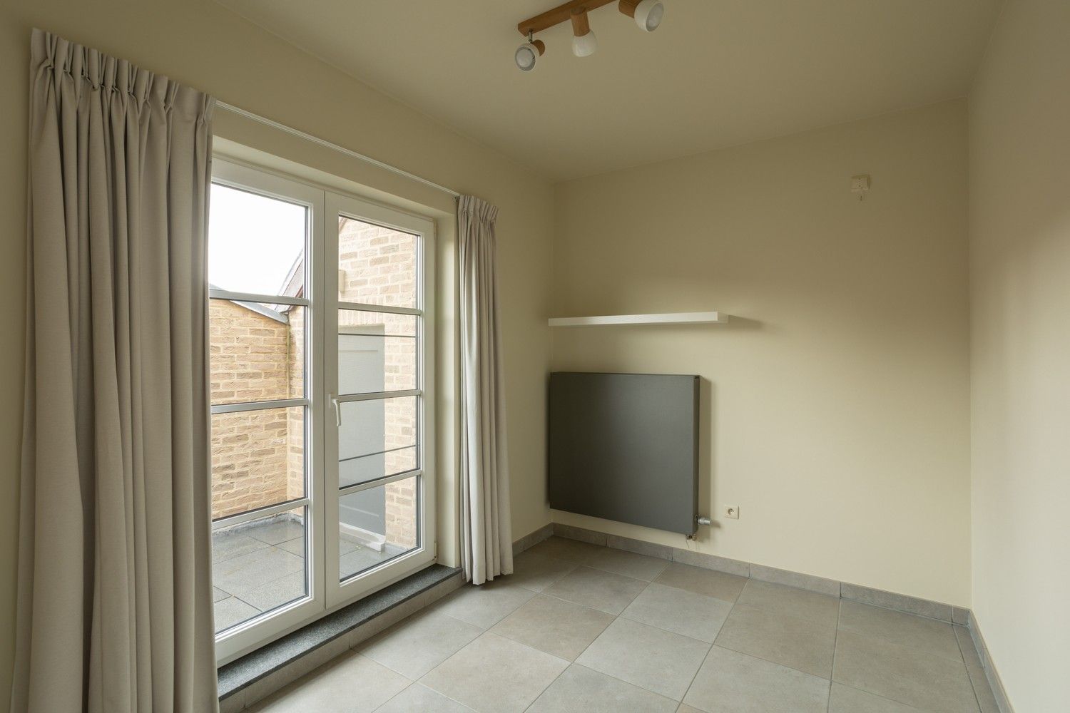 DUPLEXAPPARTEMENT MET 3 SLAAPKAMERS EN PARKEERPLAATS IN HET CENTRUM VAN BILZEN foto 11