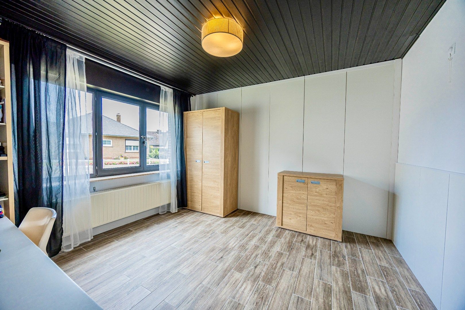 Ruime bungalow te koop met 2 slpk, garage en tuin foto 17