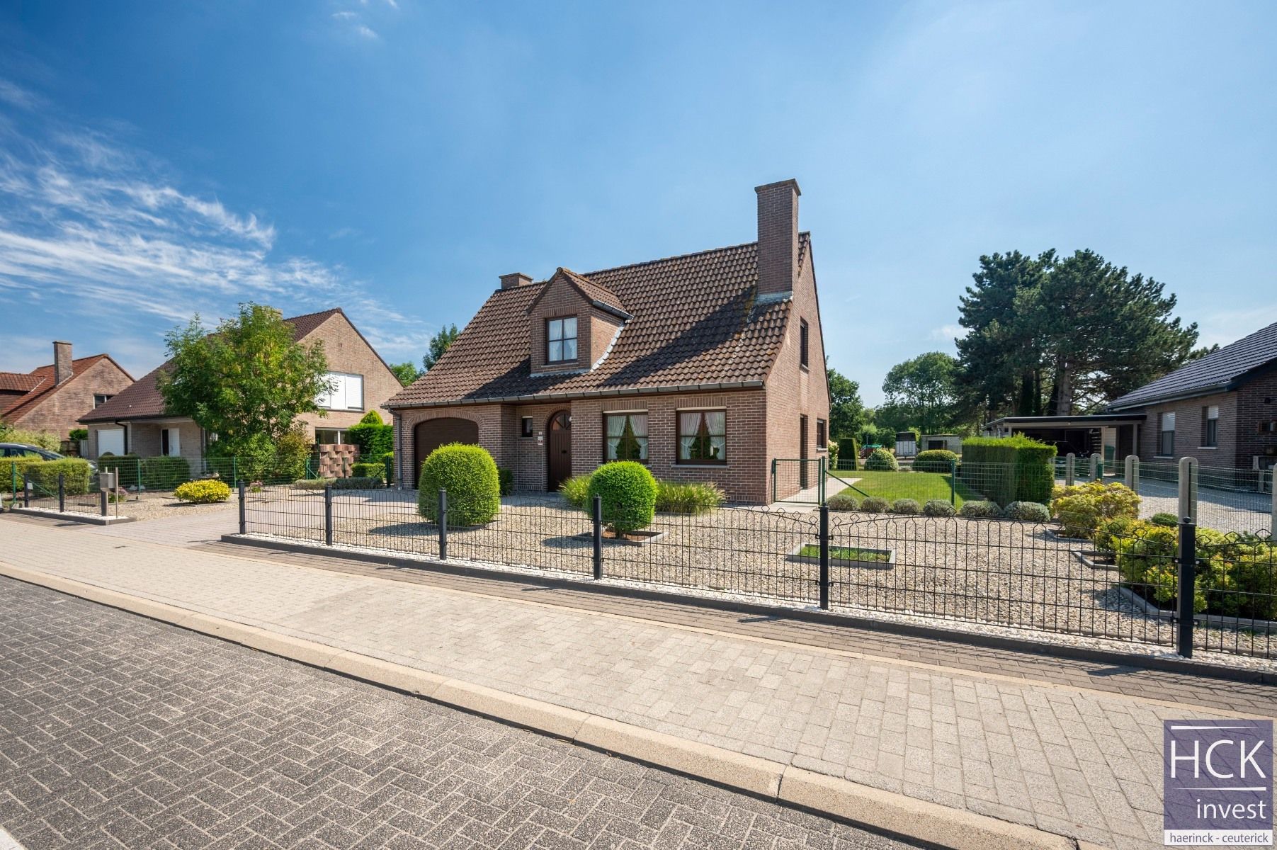 Hoofdfoto van de publicatie: KRUISHOUTEM - Mooi gelegen alleenstaande woning, kraaknet onderhouden!