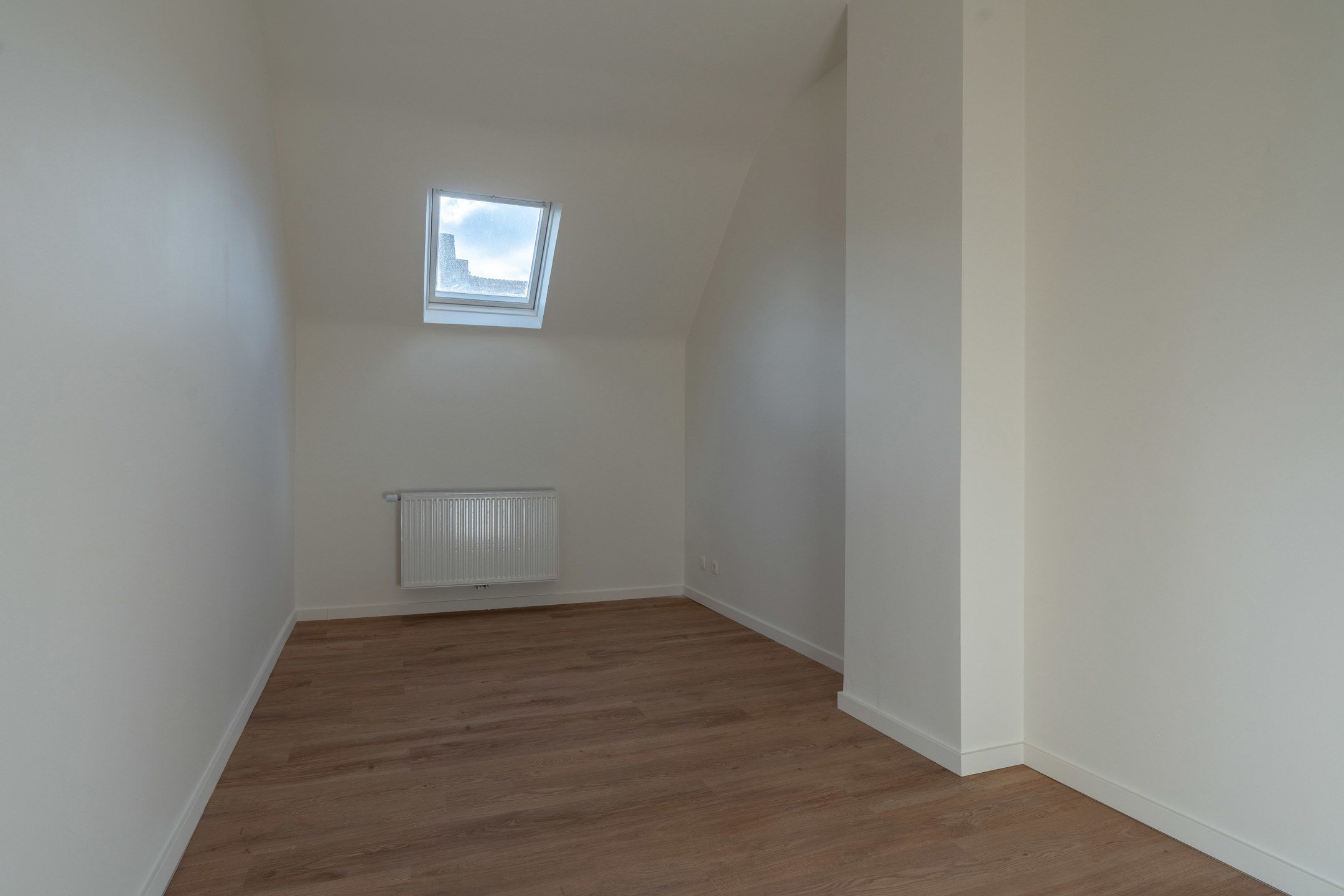 Handelspand met woonst (350m²) op wandelafstand van de Grote Markt. foto 28