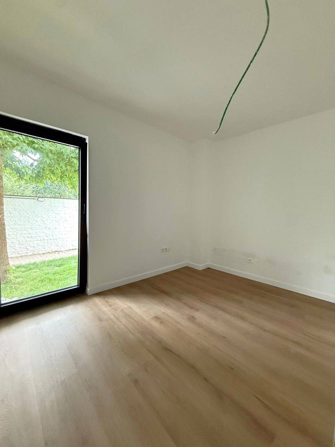 Gerenoveerd gelijkvloers appartement met 2 slaapkamers foto 10