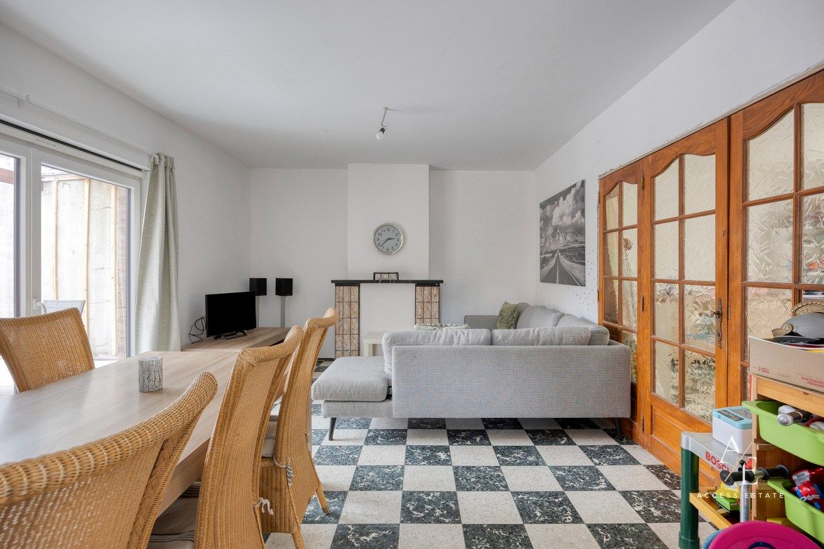 Ruime halfopen woning met potentieel in rustige straat te Melle foto 6