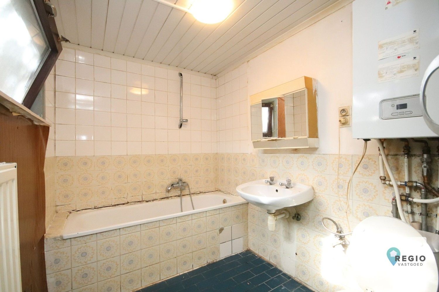 Te renoveren woning te Gentbrugge, Sas- en Bassijnwijk. foto 12