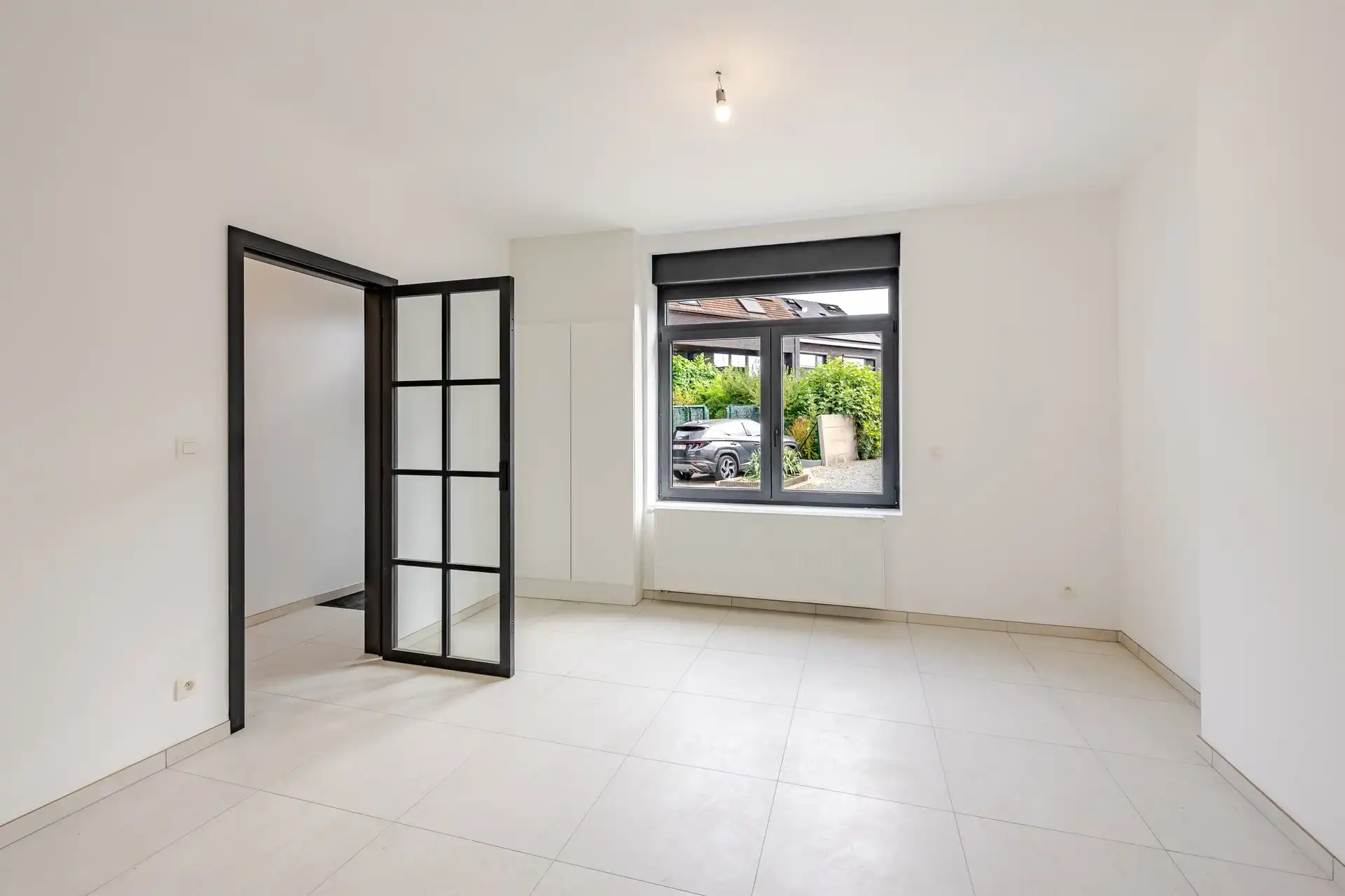 Instapklare, volledig gerenoveerde gezinswoning met 4 slaapkamers, garage en zonnige stadstuin foto 6