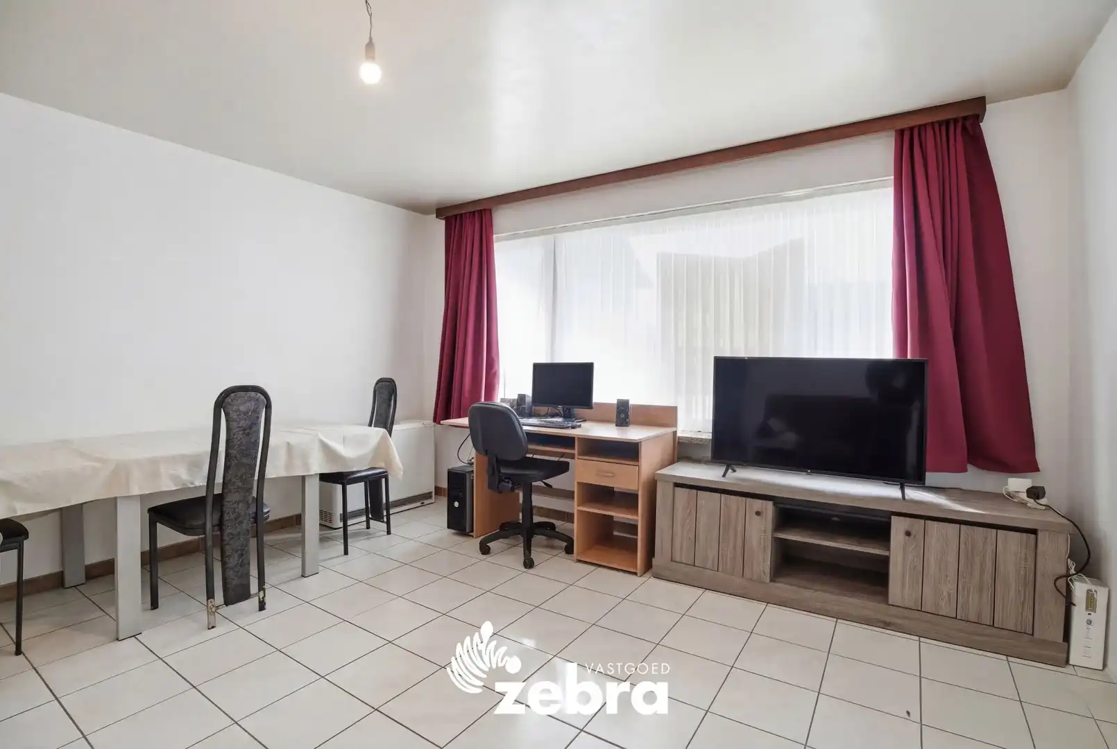 Gelijkvloers 2-slaapkamerappartement met terras en garage in centrum Tielt! foto 5