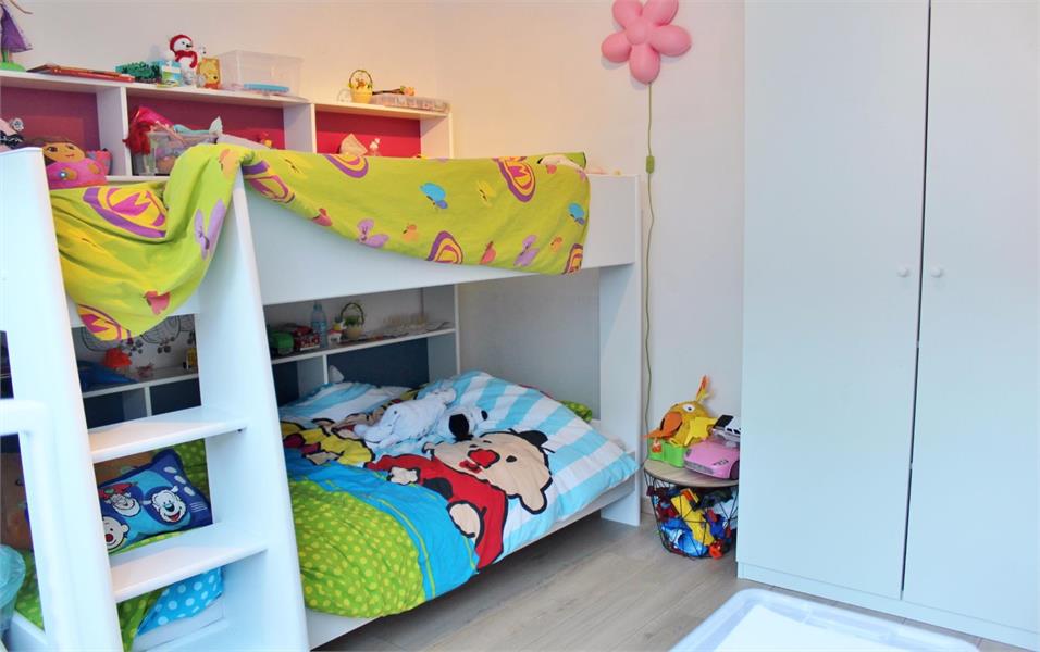 Mooi gelijkvloers appartement met terras en garagebox! foto 7