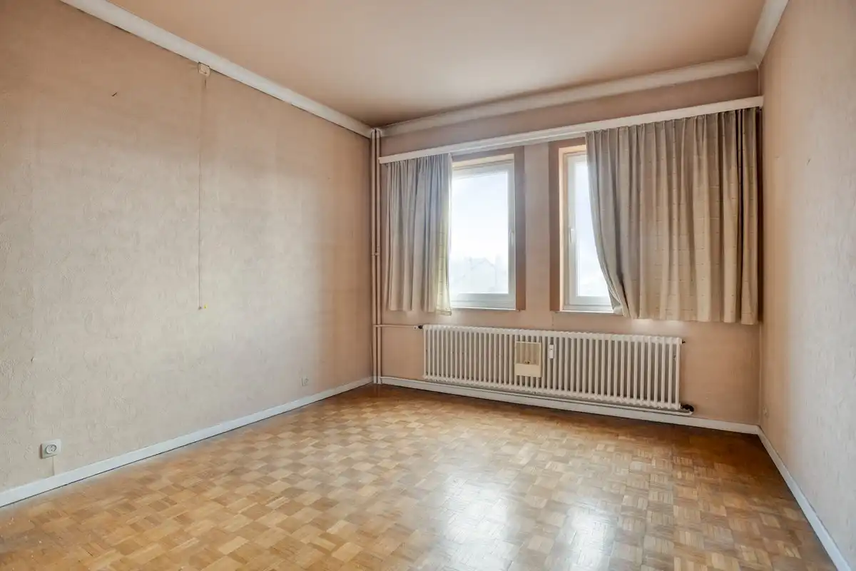 Ruim appartement met 3 slaapkamers, kelderberging en garagebox aan de rand van het centrum foto 9