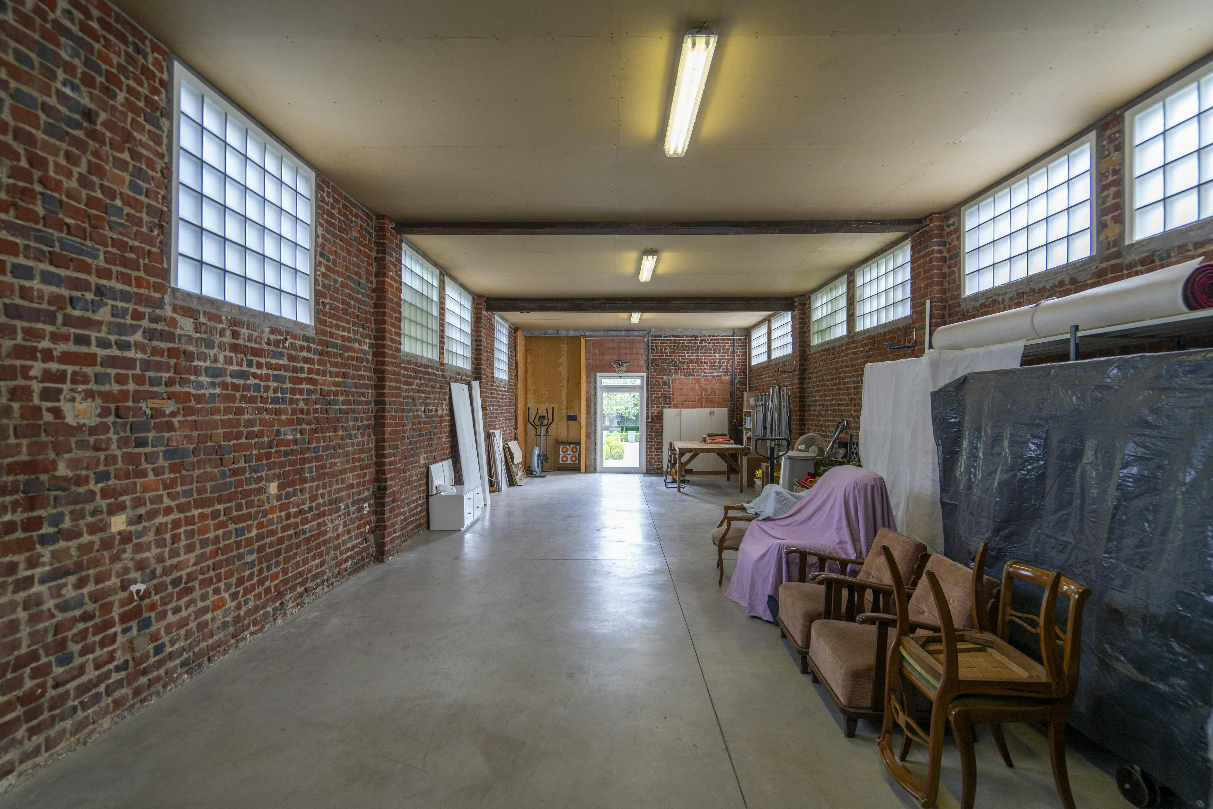 Unieke loftwoning met ruime garage en prachtige tuin foto 21