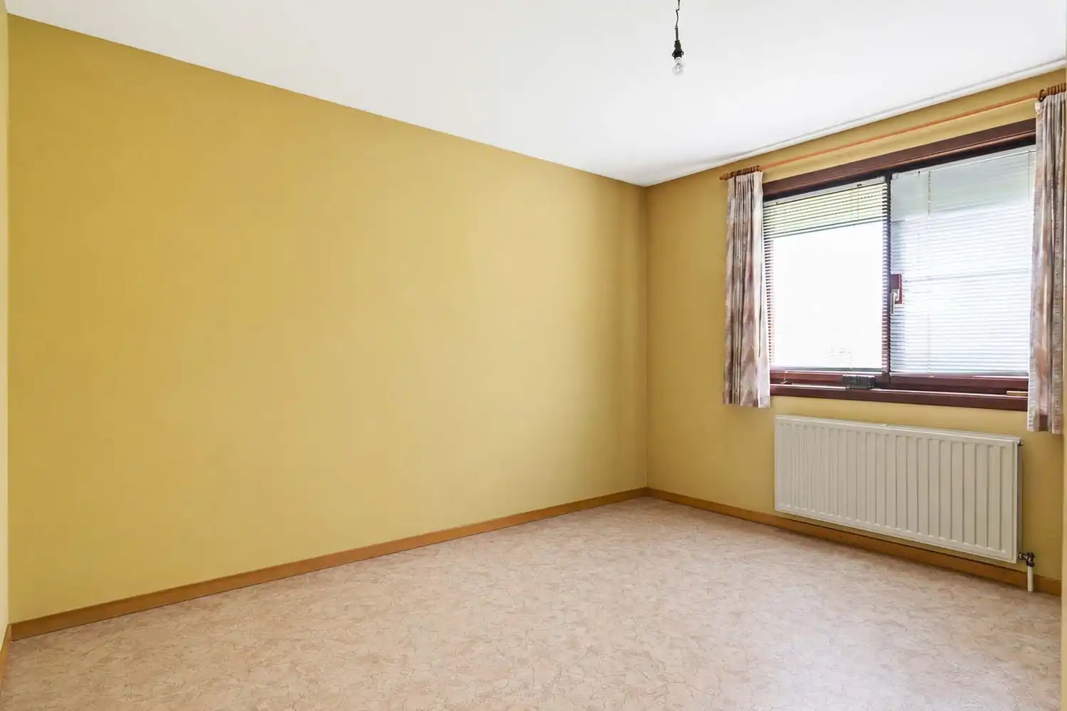 Vrijstaande laagbouwwoning met zonnige tuin en uitbreidingsmogelijkheden in Oelegem! foto 9