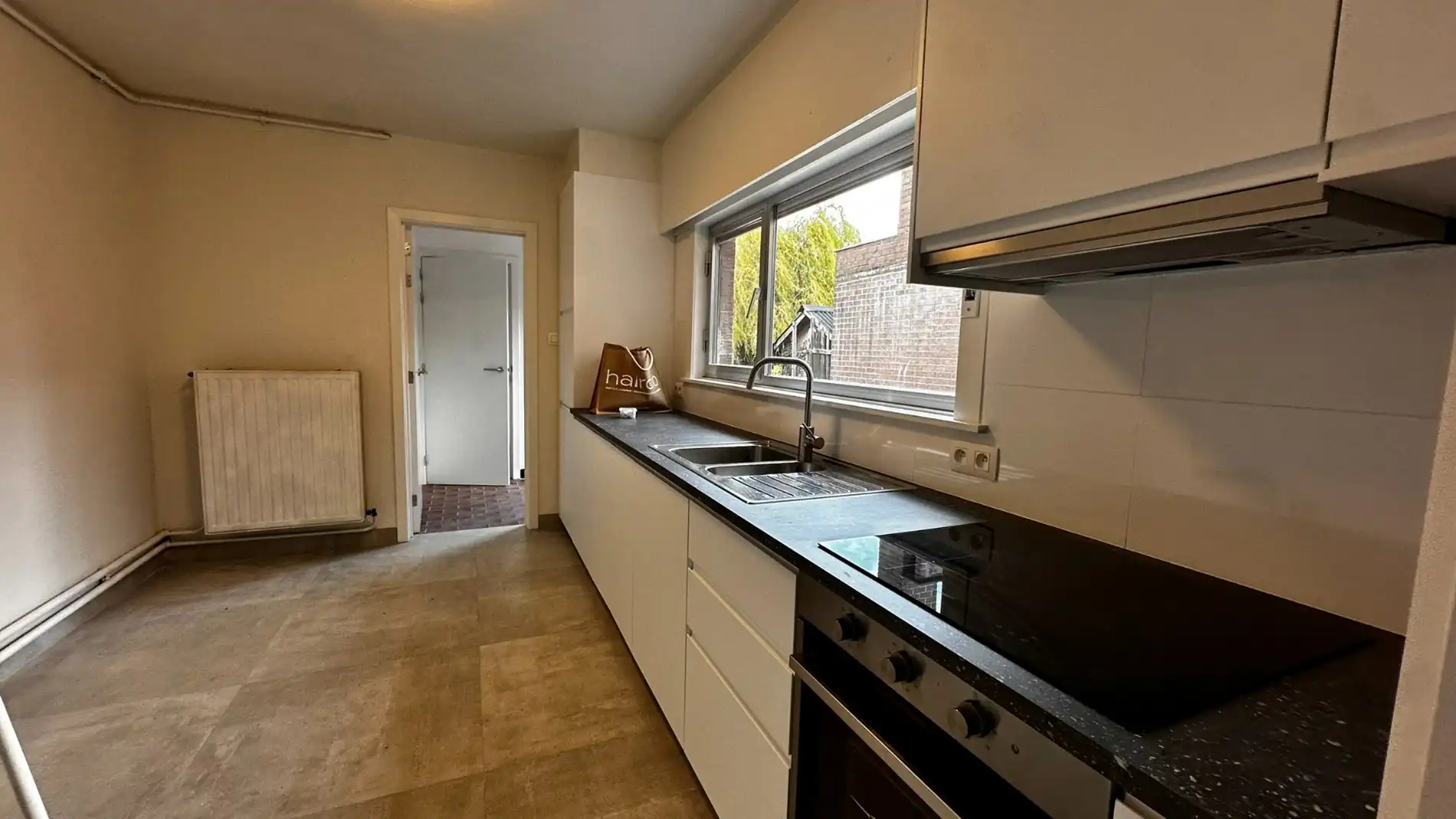 Gerenoveerde rijwoning te huur in Zele foto 5