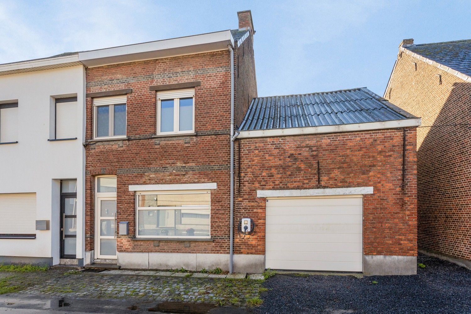 Instapklare woning met 3 slaapkamers, zonnige tuin en garage. foto 2