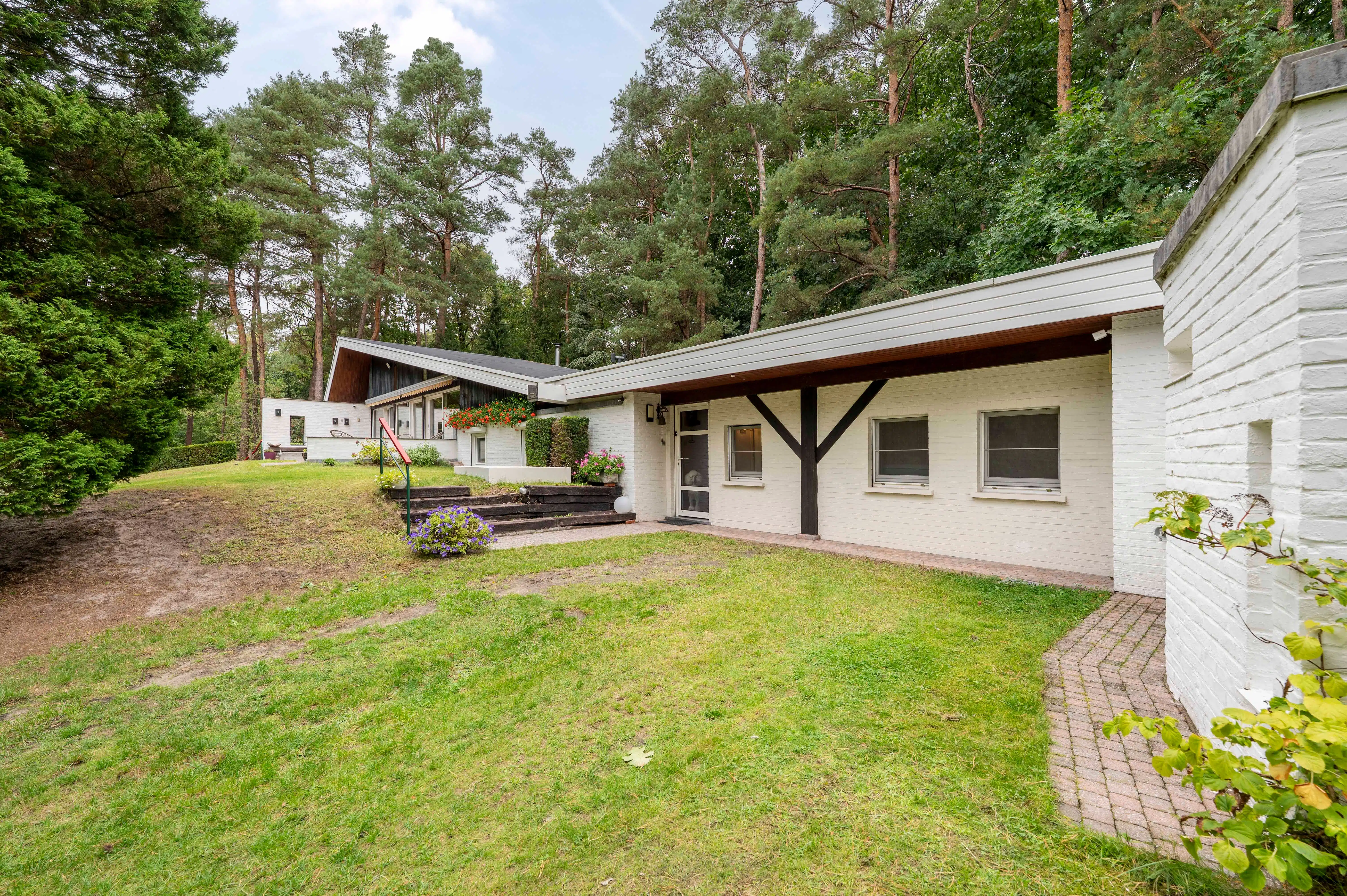 Architecturale sixtieswoning in volledige privacy en uniek natuurlandschap! foto 24
