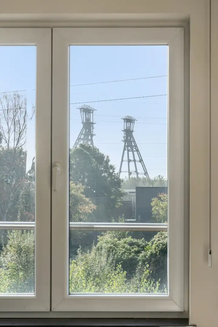 Exclusief penthouse met ruim terras, 2 slpk, extra brede autostaanplaats, centrum Houthalen foto 5
