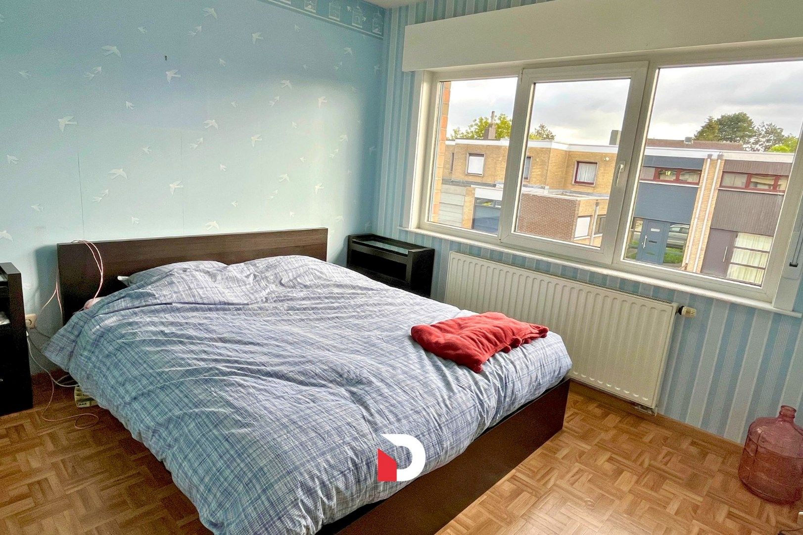 Ruime half open woning met 3 slaapkamers en prachtige tuin foto 10