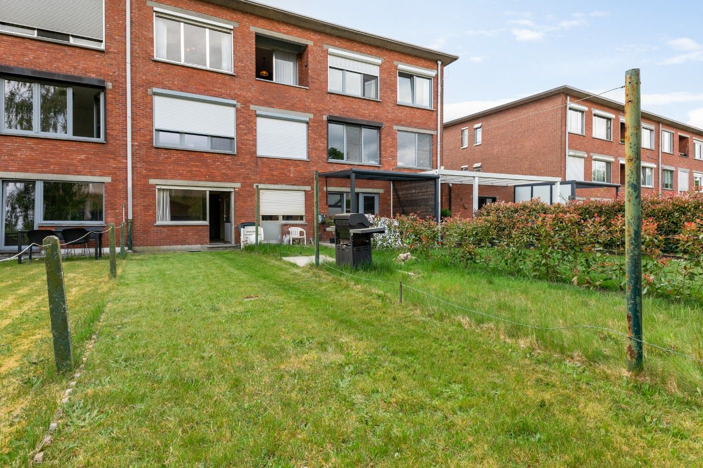 Op te frissen app. op 2e verd. met 2slpk., garage, berging en tuin foto 24