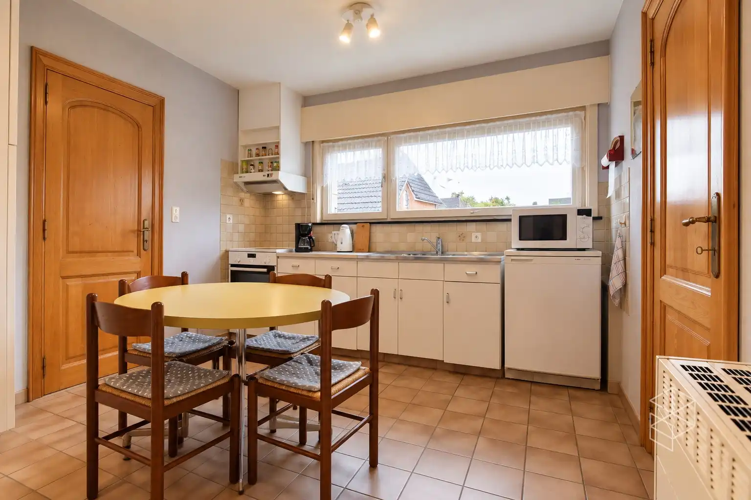 Zeer goed onderhouden gezinswoning met 4 slaapkamers en zonnige tuin foto 13