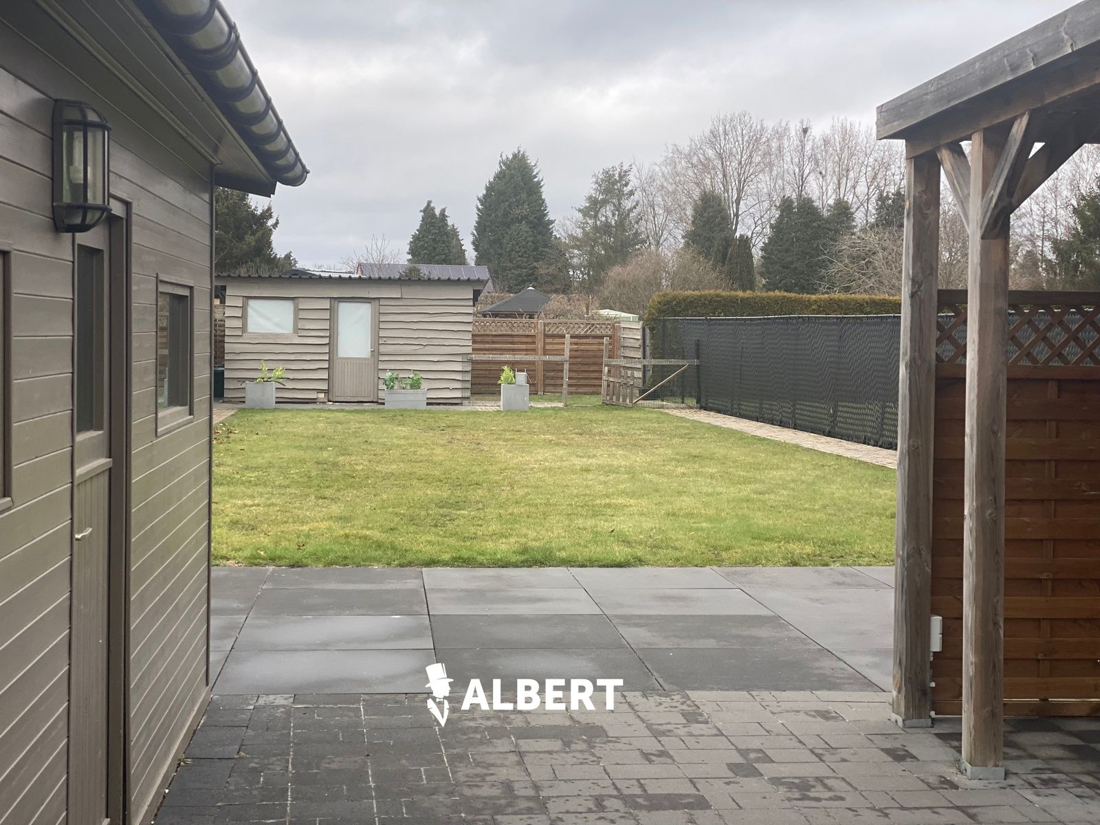 Gelijkvloers appartement met carport op perceel van 775m²! foto 4