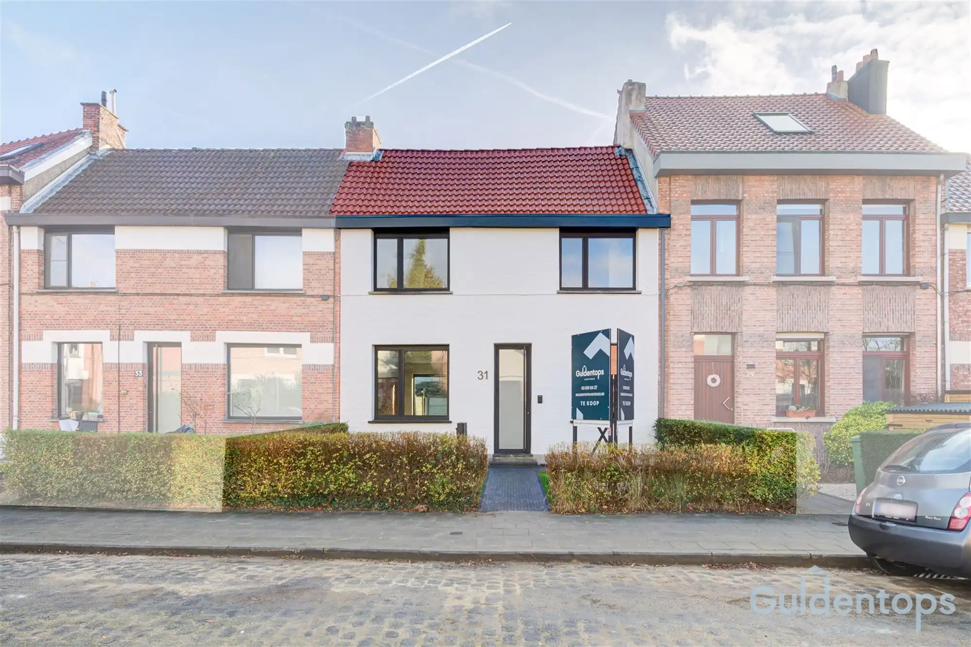 knappe, vernieuwde gezinswoning met tuin in hartje Berchem foto 2