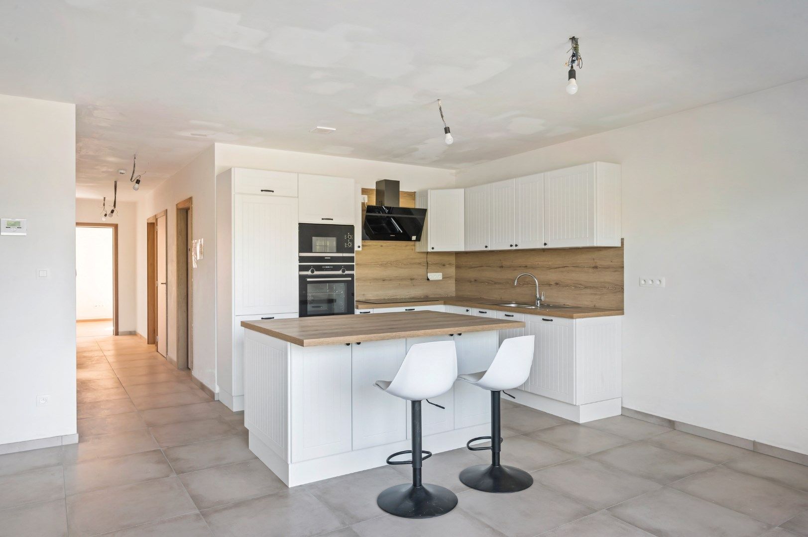 NIEUWBOUWAPPARTEMENT MET EPC A, 3 SLPKS EN 2 ZONGERICHTE TERRASSEN foto {{pictureIndex}}