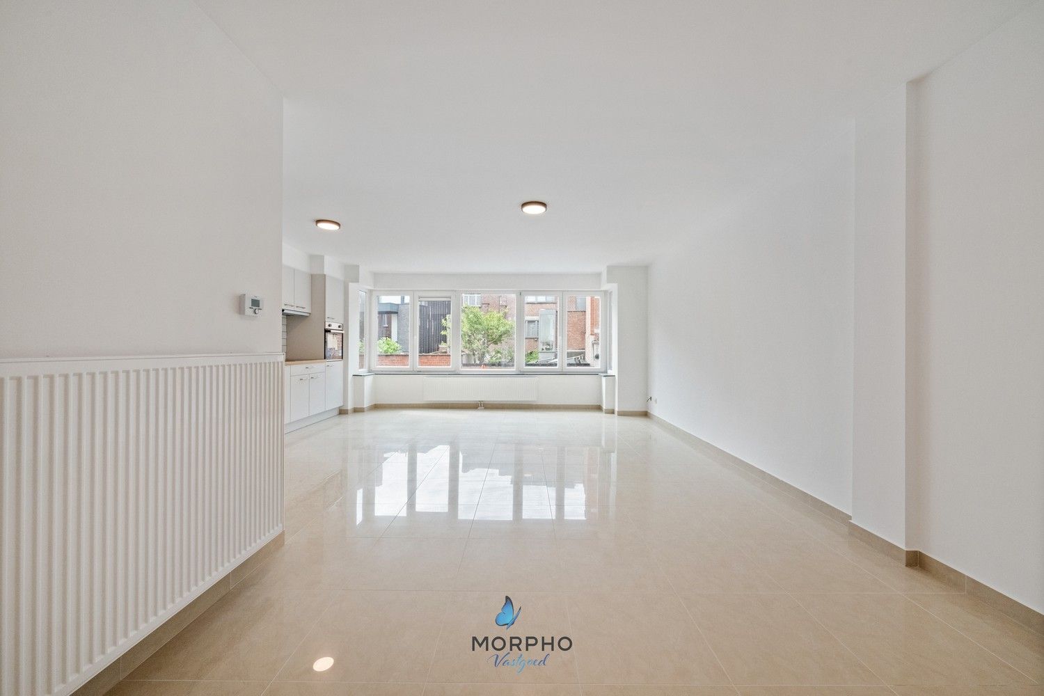 Modern en energiezuinig appartement met 2 slpks en vergezicht op de Schelde – hartje Temse! foto 3