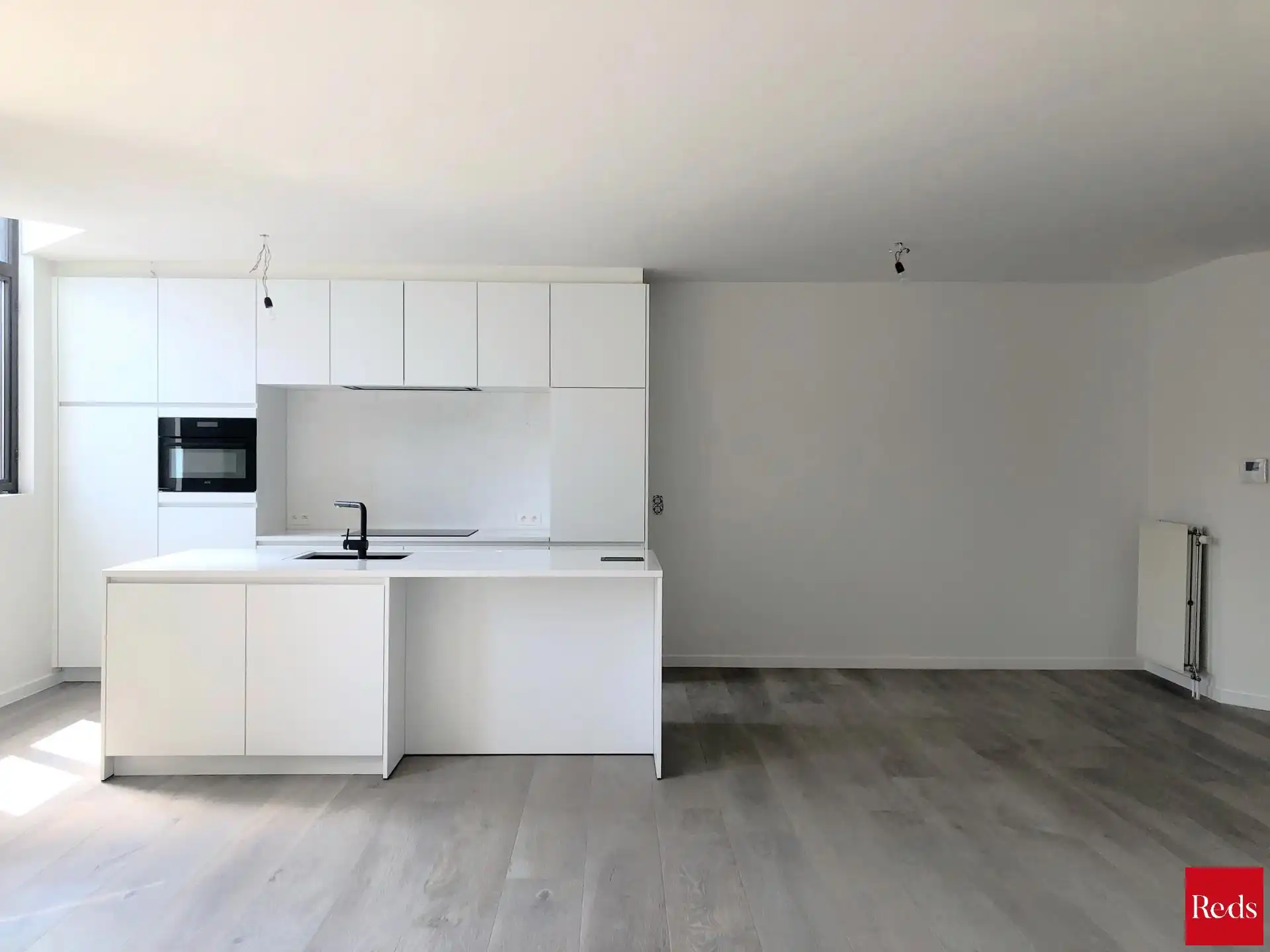 Gerenoveerd appartement te huur op de tweede verdieping in het centrum van Schilde! foto 4