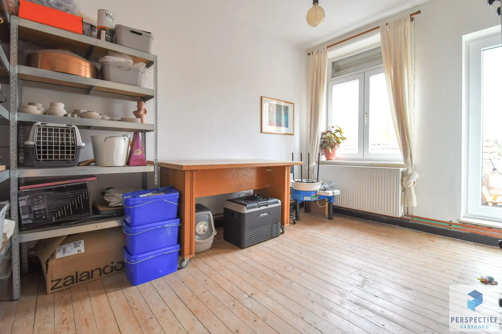 Mooie INSTAPKLARE stadswoning met 3 slpk en koer foto 9