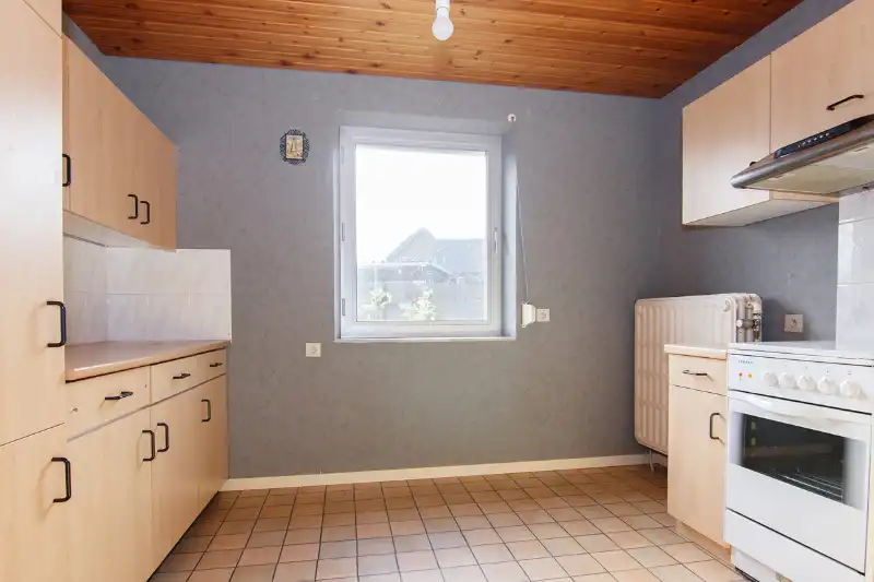 Te renoveren (uitbreidbare) woning (6% btw) of sloop/heropbouw op een rustig gelegen perceel van +- 11are op wandelafstand van het centrum van Diepenbeek! foto 14