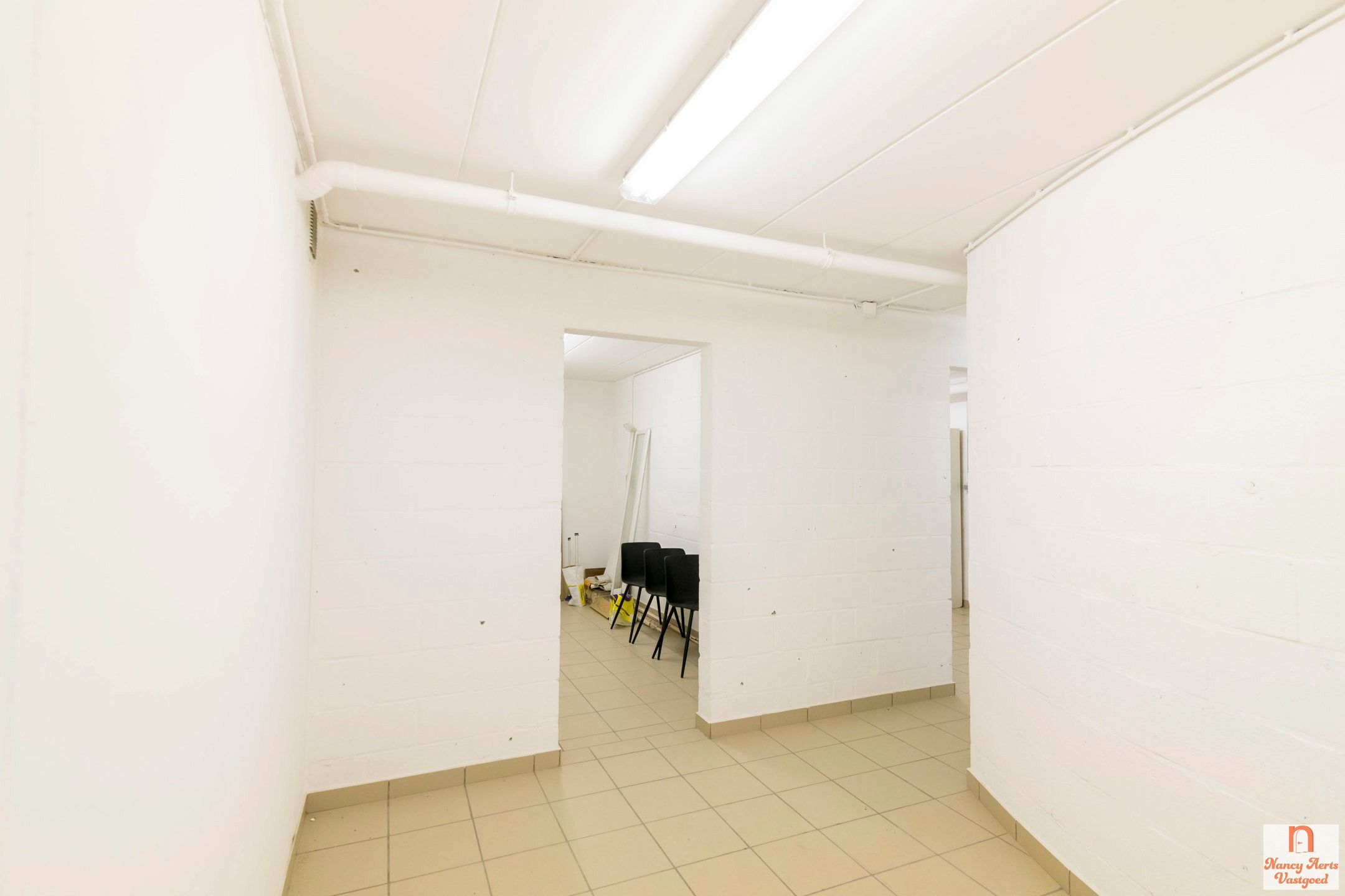 Lichtrijk duplexappartement met grote kelder en mega terras foto 30