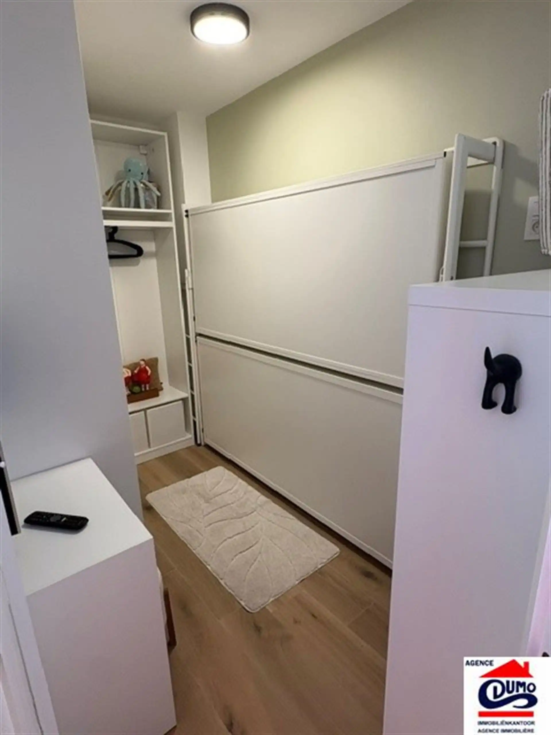 Compleet gerenoveerde studio met fantastisch zeezicht! foto 12