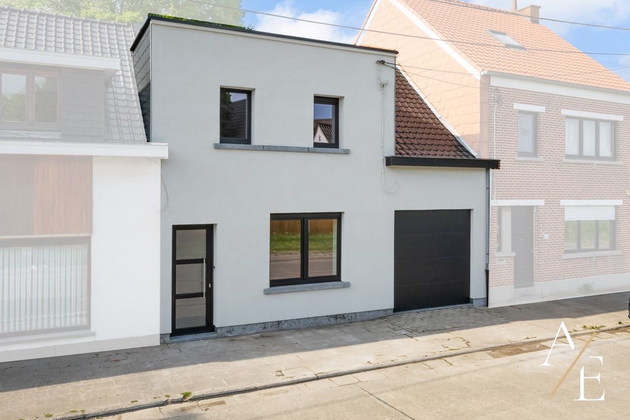 Totaal gerenoveerde energiezuinige gezinswoning inpandige garage en aangename tuin foto 10