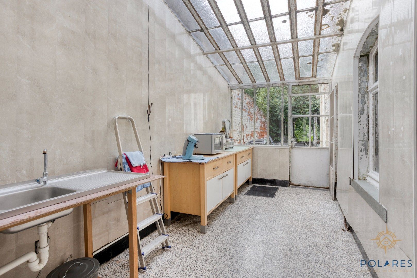 Goed gelegen, te renoveren rijwoning in centrum Hoegaarden foto 7