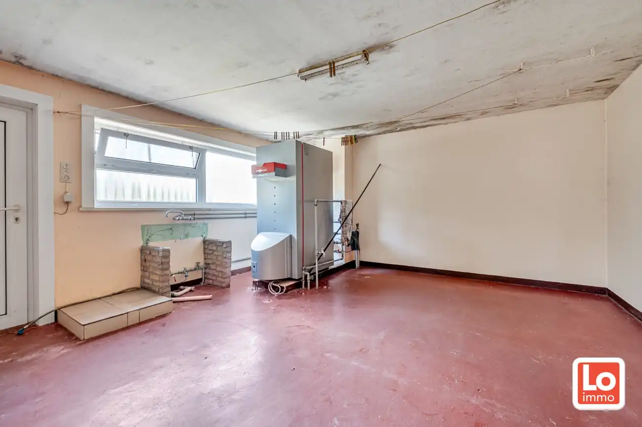 VERKOCHT! Statige open woning met ruim bijgebouw op groot perceel grond in het centrum van Kalken! foto 24