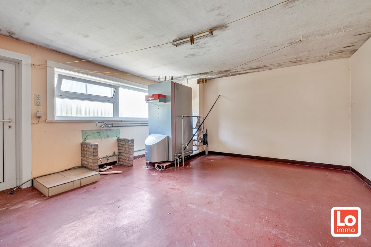Statige open woning met ruim bijgebouw op groot perceel grond in het centrum van Kalken! foto 24