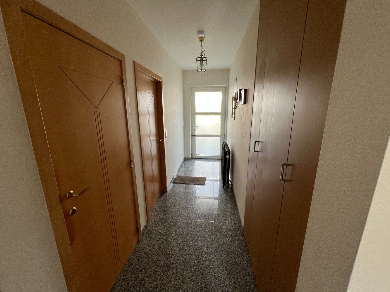 Luxueus gelijkvloers appartement met 3 slaapkamers, tuin en garage foto 18