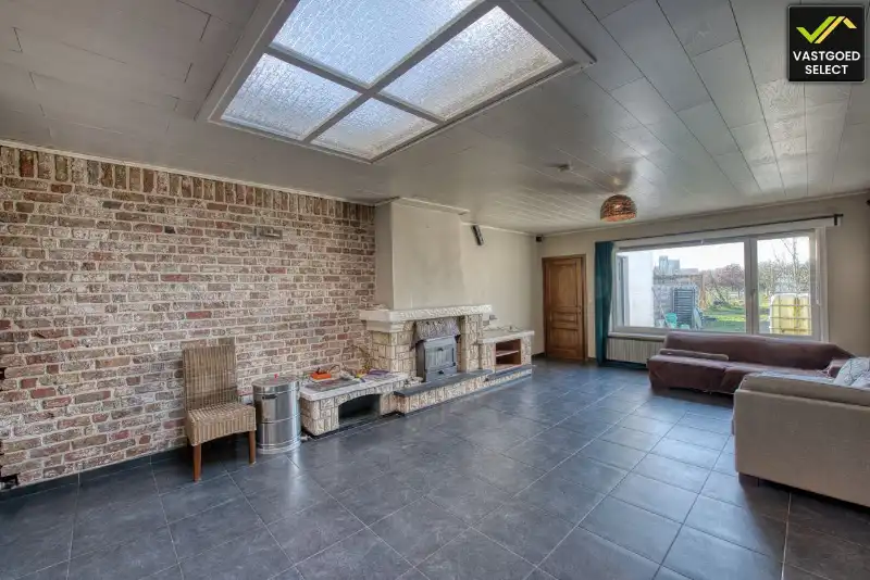 Rijwoning met uitzonderlijk perceel van 1.632 m² en landelijk uitzicht in het centrum van Eeklo foto 3