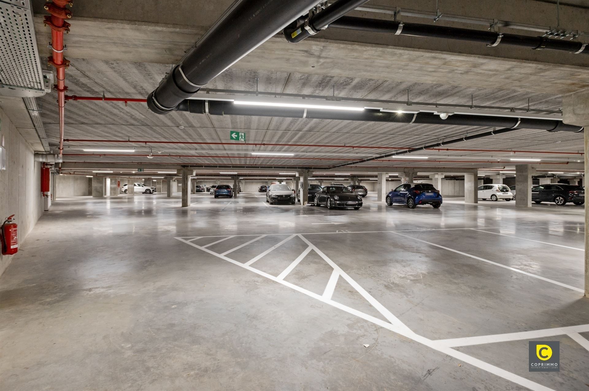 Ondergrondse autostaanplaatsen op de grens Berchem-Mortsel foto {{pictureIndex}}