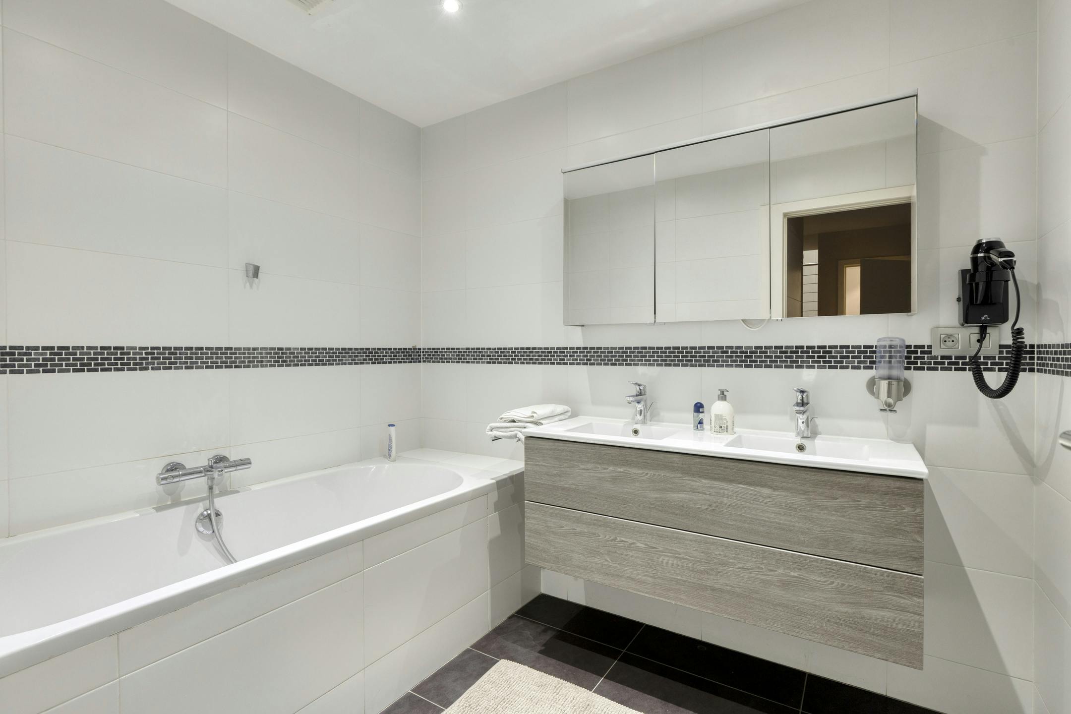 Duplex appartement 2 slaapkamers te Brussel Koningsstraat foto 11