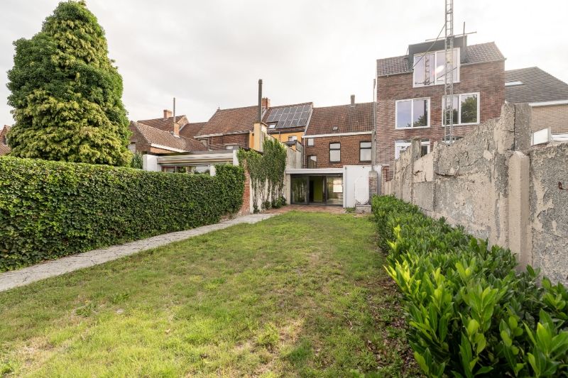 Ruime en veelzijdige rijwoning met garage achteraan en aparte ingang foto 18