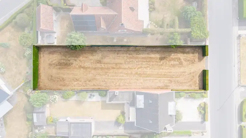 Bouwgrond te koop in Kachtem – 654 m² voor een halfopen gezinswoning foto 2