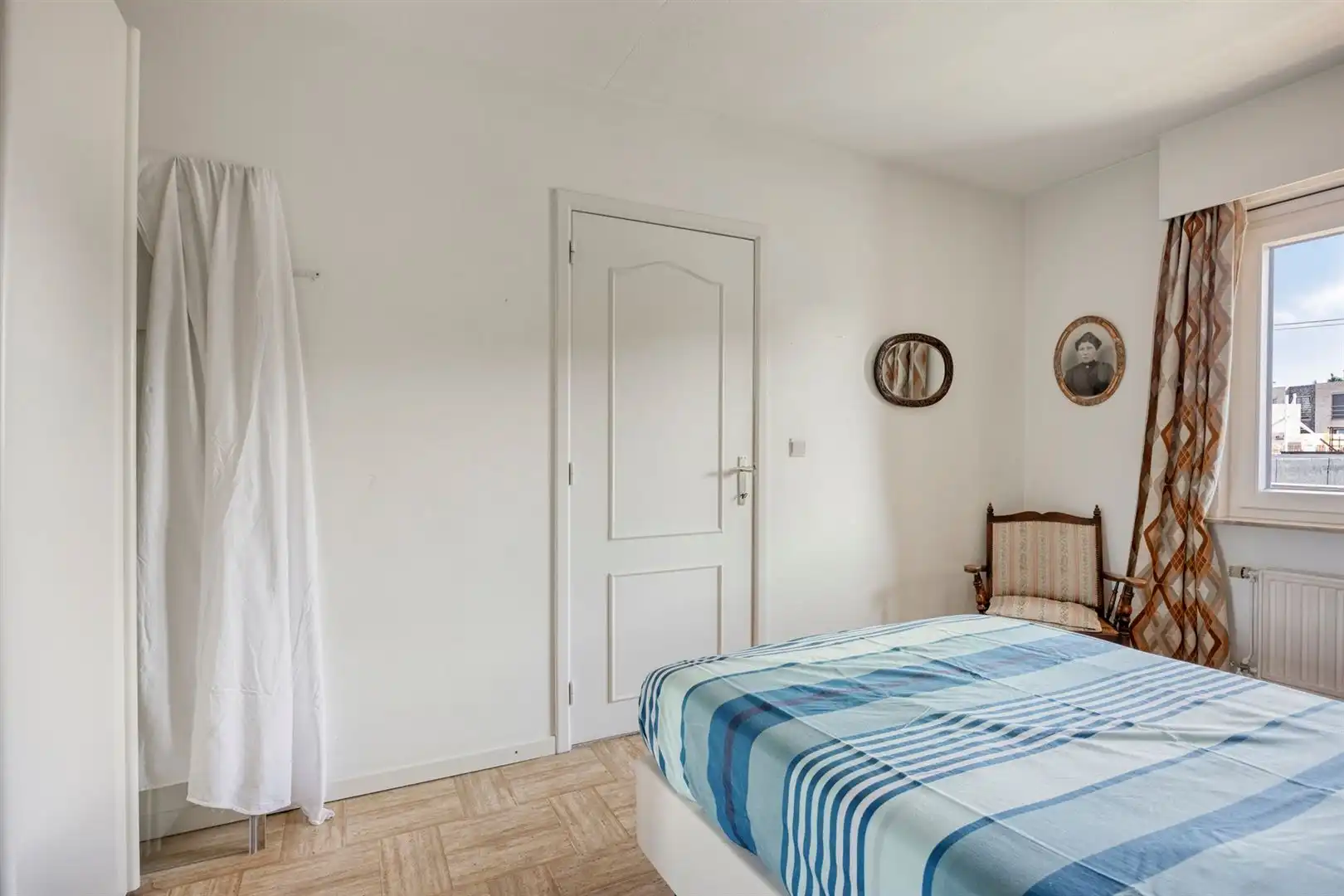 TE KOOP: Verzorgd appartement met 2 slaapkamers en ondergrondse staanplaats in hartje Heusden! foto 12