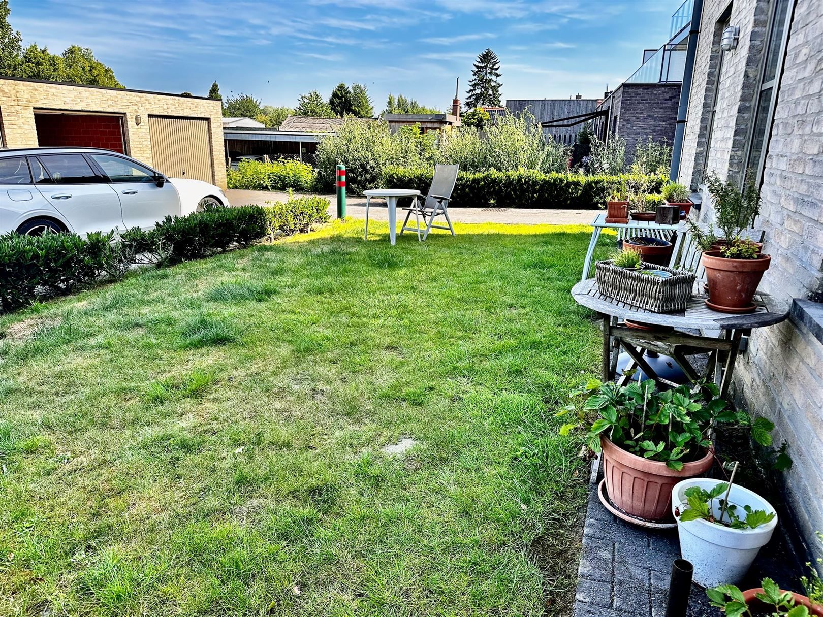 gelijkvloers app met 2 slp, tuintje en garage foto 12