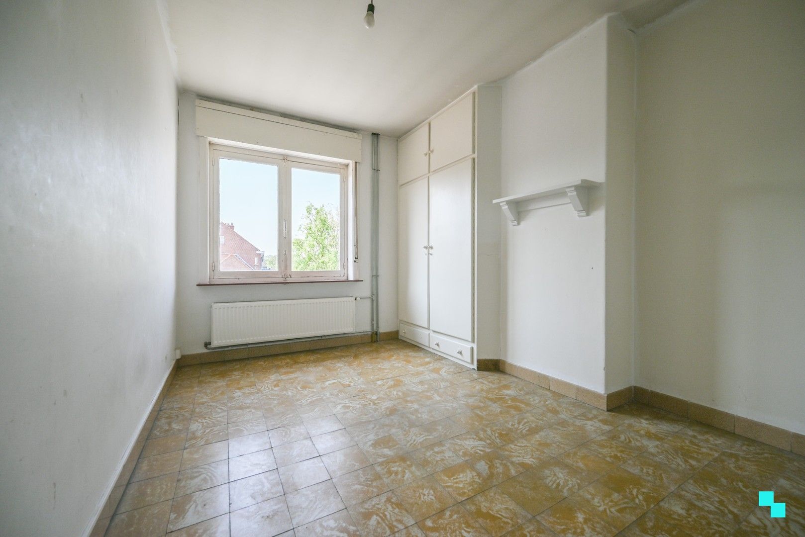 Eéngezinswoning met garage en achteruitweg in het hartje van Sint-Eloois-Winkel foto 24
