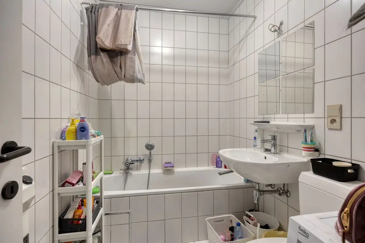 Opbrengsteigendom met 3 appartementen en 7 garages foto 20