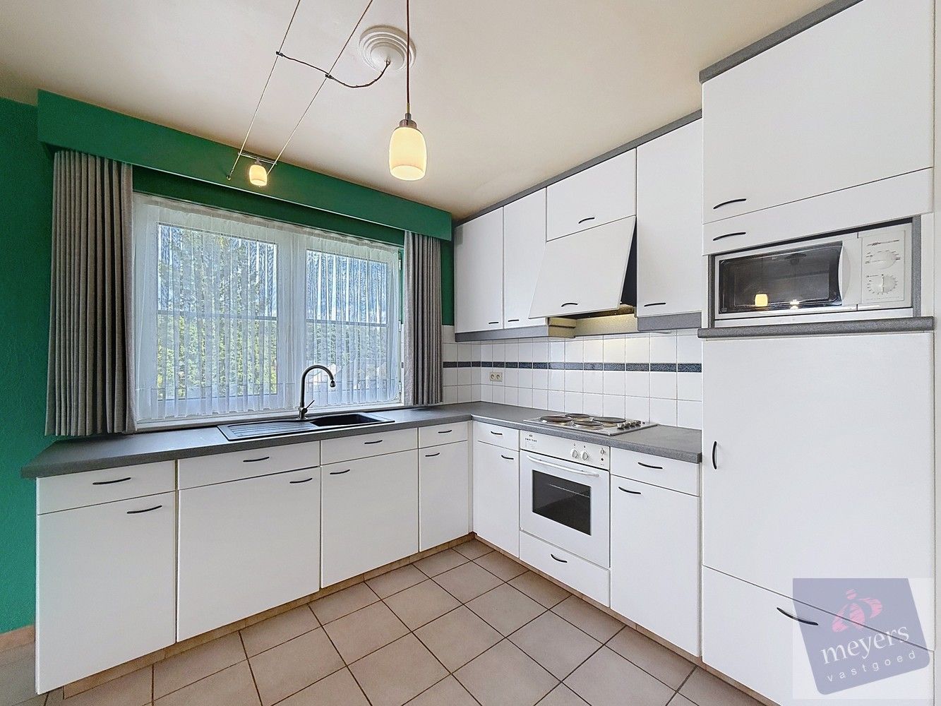 Ruim appartement met garagebox in Bilzen-Schoonbeek foto 11