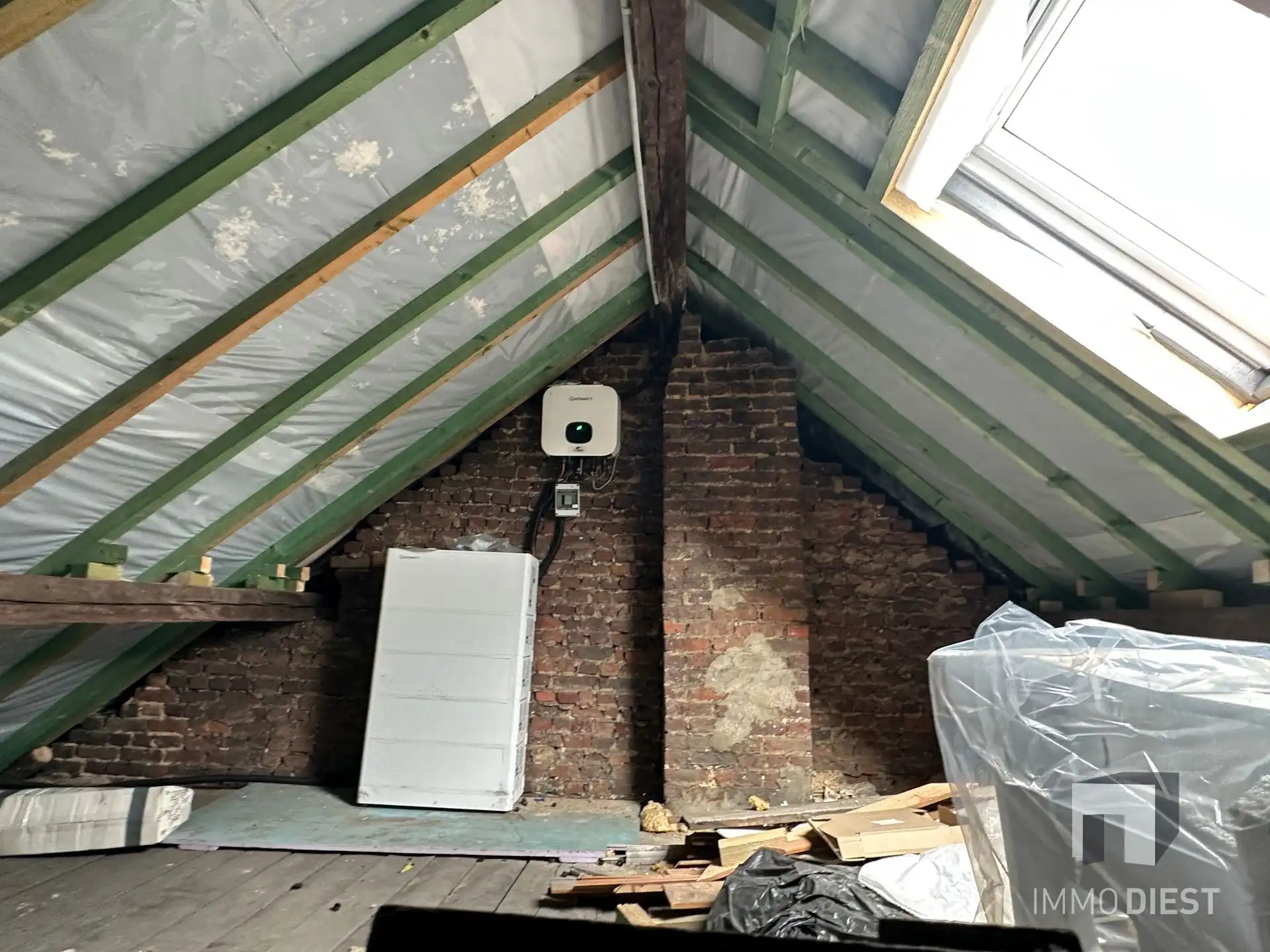 Energiezuinige woning met 3 slaapkamers, extra ingerichte leefruimte, zonnige stadstuin en garage in het centrum van Diest. foto 24
