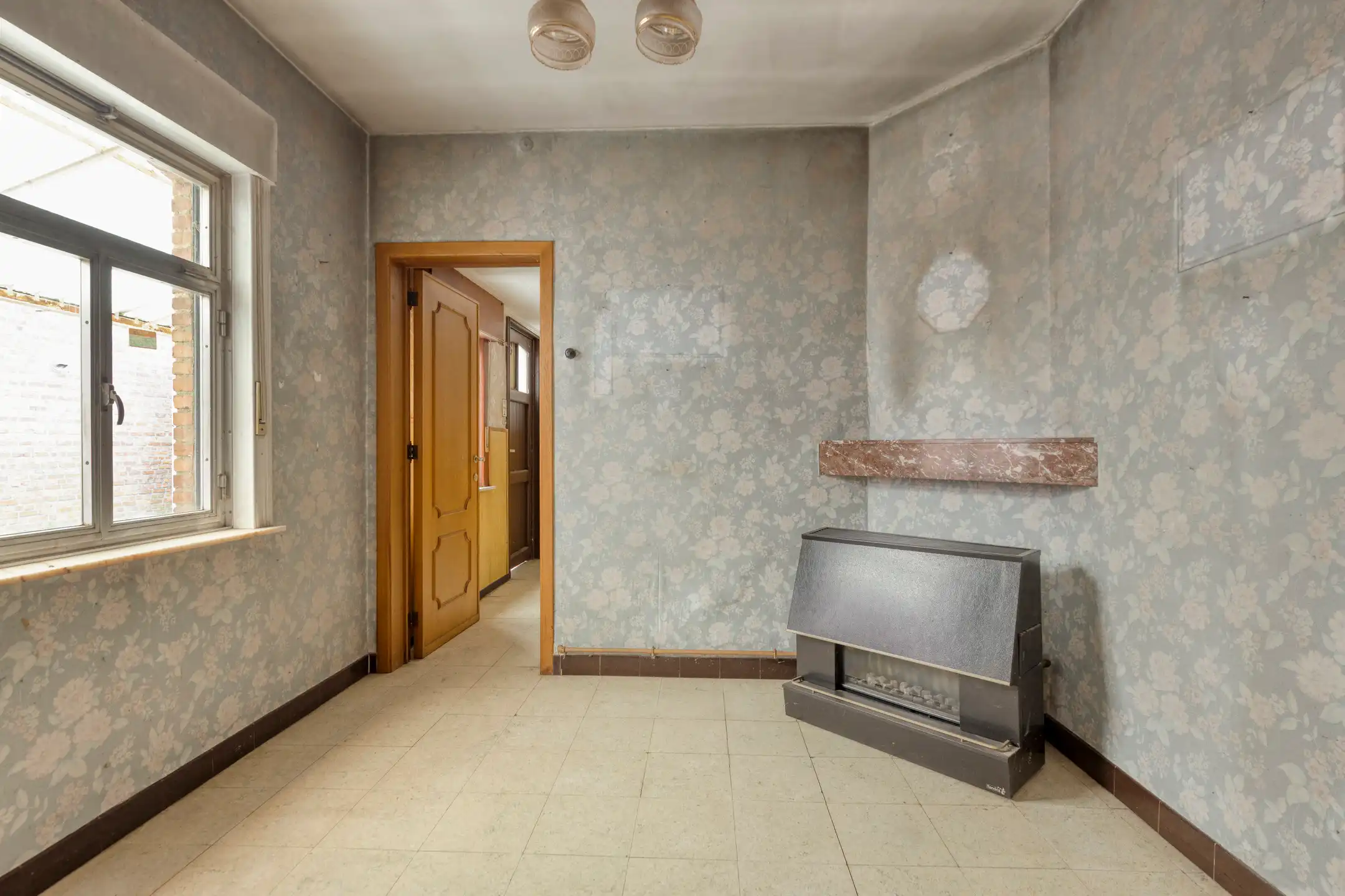 Te renoveren woning met zeer grote tuin op rustige ligging foto 6