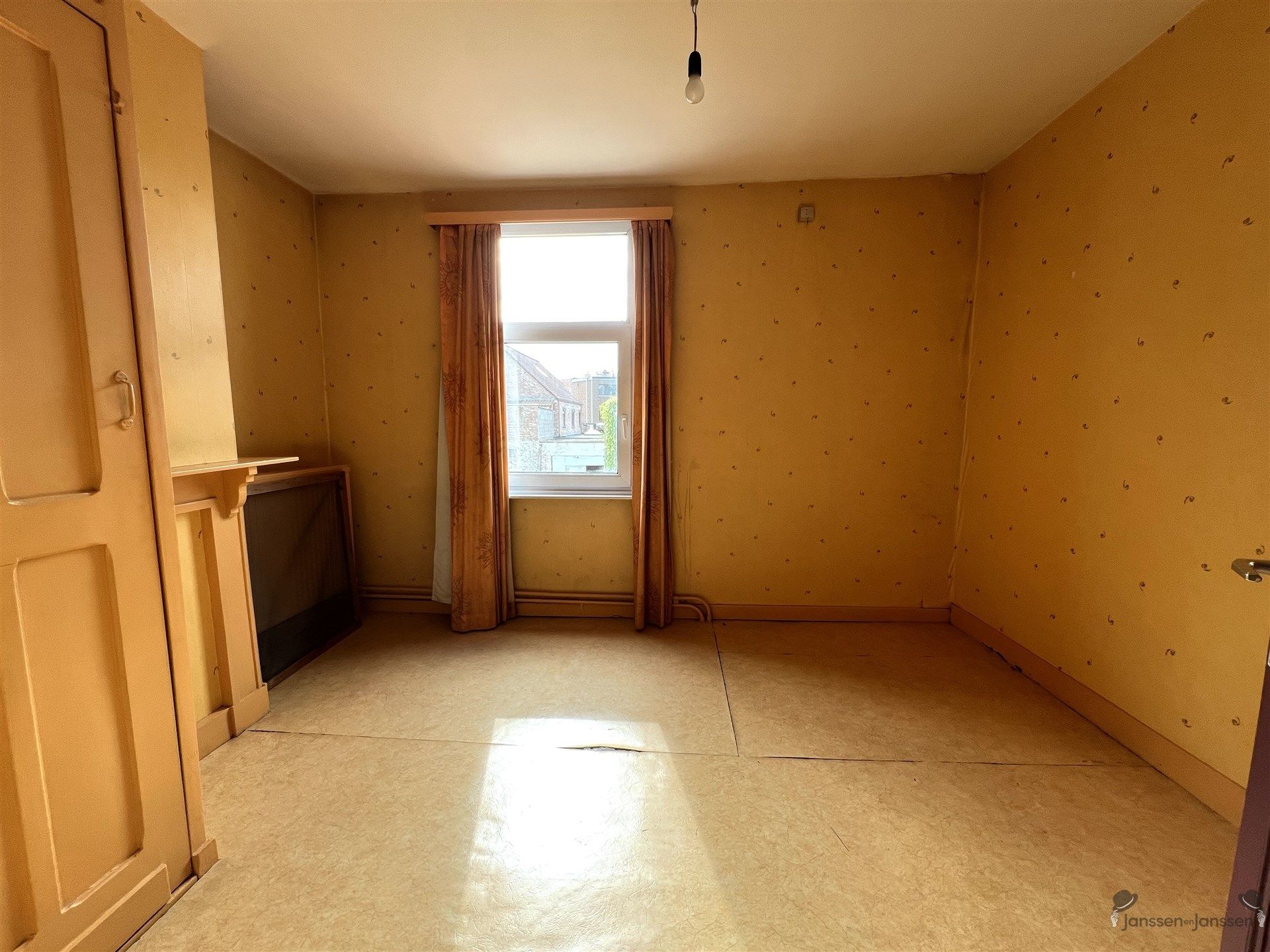 Te renoveren centrumwoning foto 14