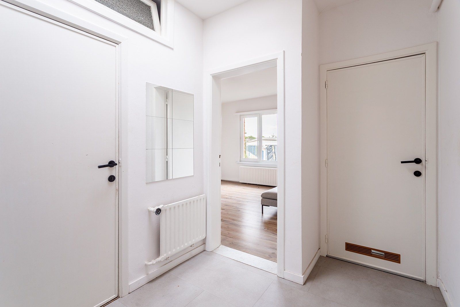 Licht en ruim appartement in rustige straat foto 10