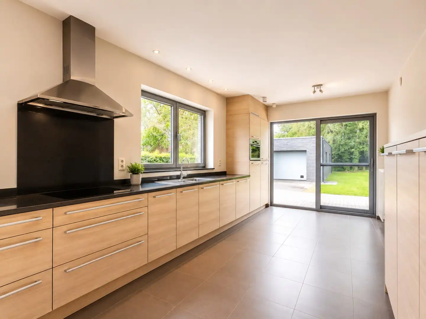 Ruime halfopen bebouwing met garage en 3 slaapkamers in Sint-Niklaas foto 8